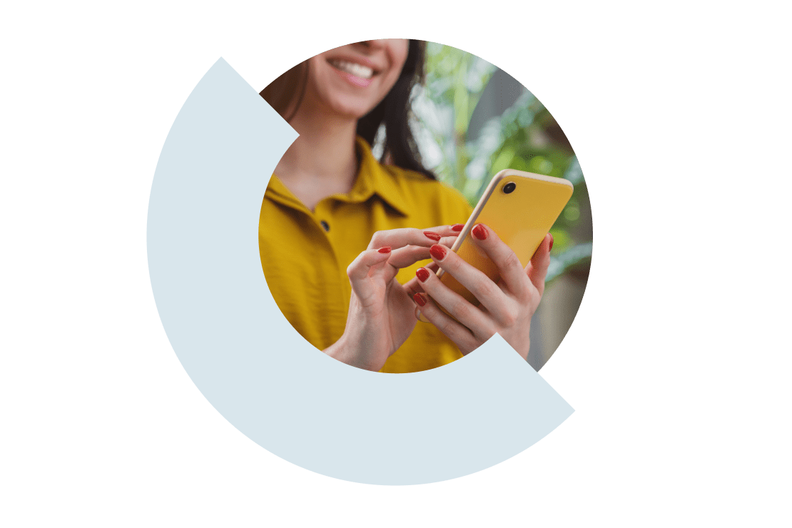 Young professional on the go, easily using the GoTo app on their mobile device.