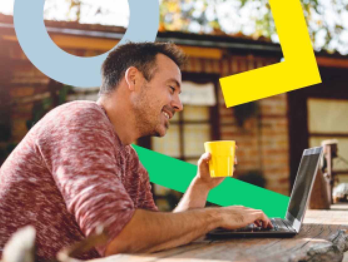 A man enjoying himself while working remote on his patio.
